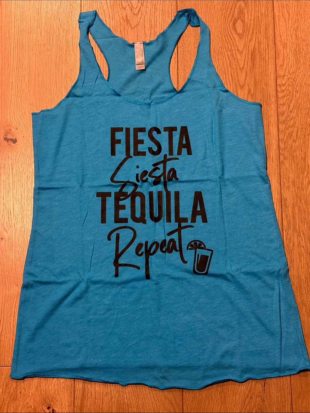 Next Level Apparel Teal Blue Racerback Tank with Black Fiesta Graphic
